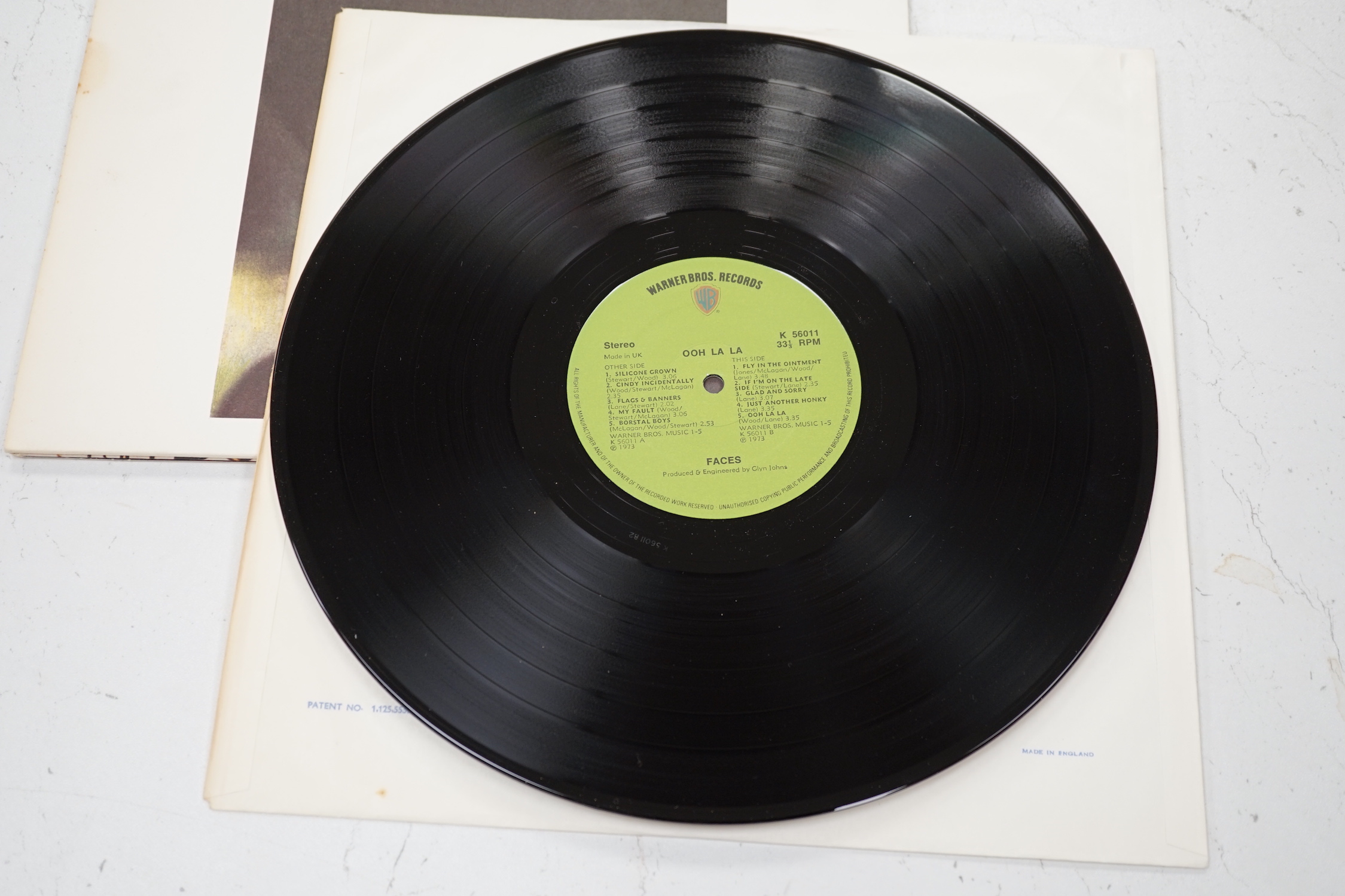 A Faces record LP album; Ooh La La, on green Warner Bros label, K 56011, with ‘Can Can’ picture to reverse label, with original lyric poster, and in die-cut fold-out sleeve